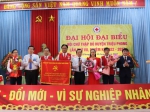 Ban chấp hành Đảng bộ huyện Triệu Phong tặng Đại hội bức trướng cho BCH Hội CTĐ huyện nhiệm kỳ 2022 - 2027 Đoàn kết – Đổi mới – Vì sự nghiệp nhân đạo.